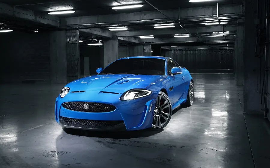 A stupid and super creepy profile photo of a stylish and classy blue car