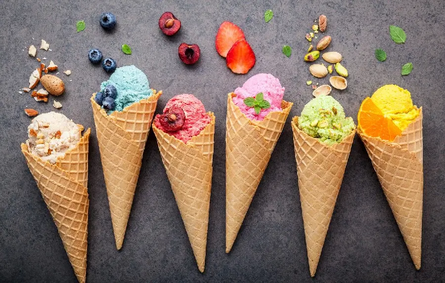 Amazing photo of sweet cone ice cream with a variety of fruity flavors and colors