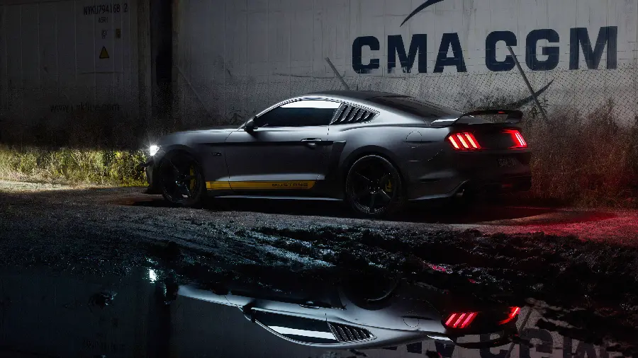 A sporty profile image of a black car of the latest model in excellent quality