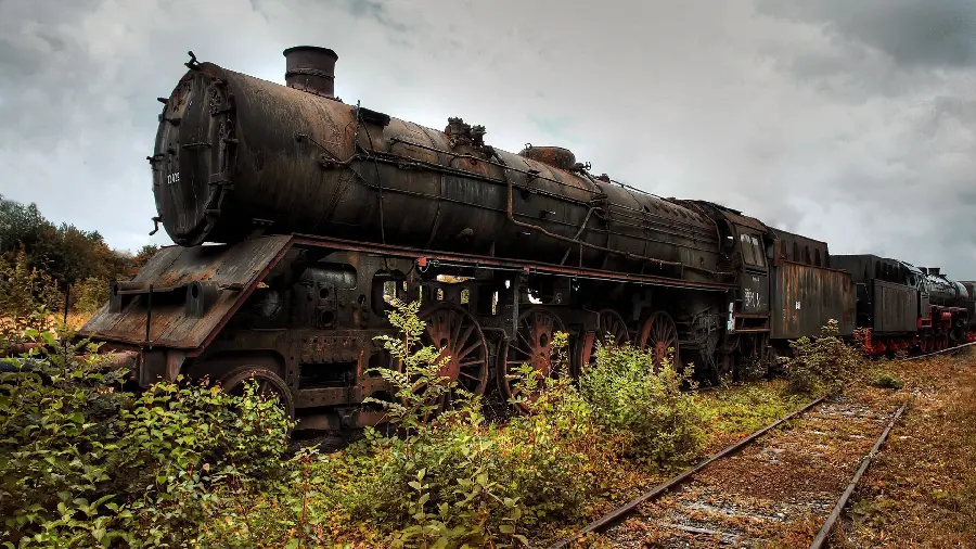 Amazing view of a decaying train and abandoned railroad tracks