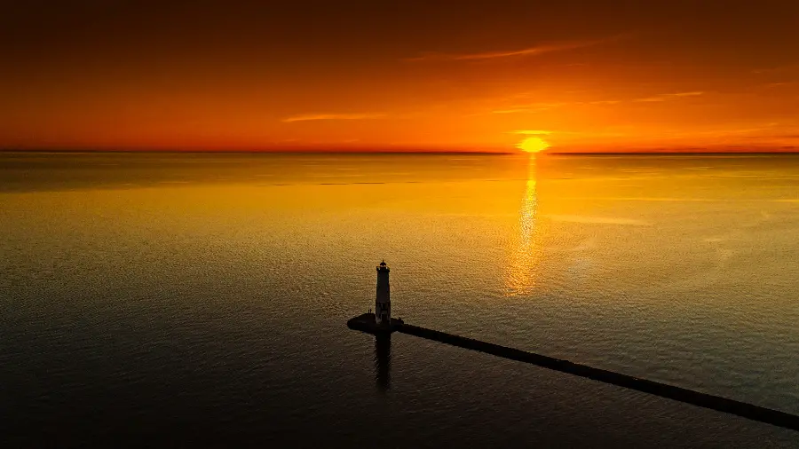 Download a background photo from Sunset in the middle of the vast sea