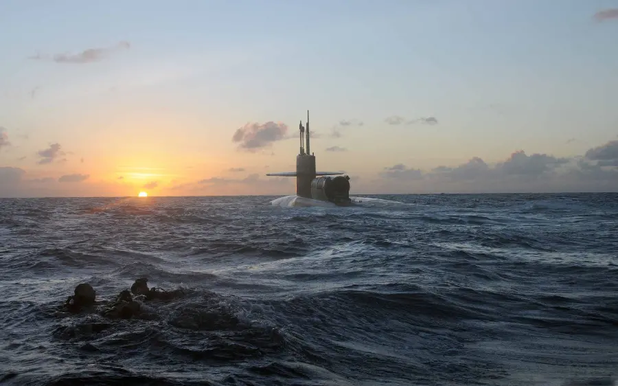 Amazing and beautiful photo of a submarine in the water with a spectacular sunset 