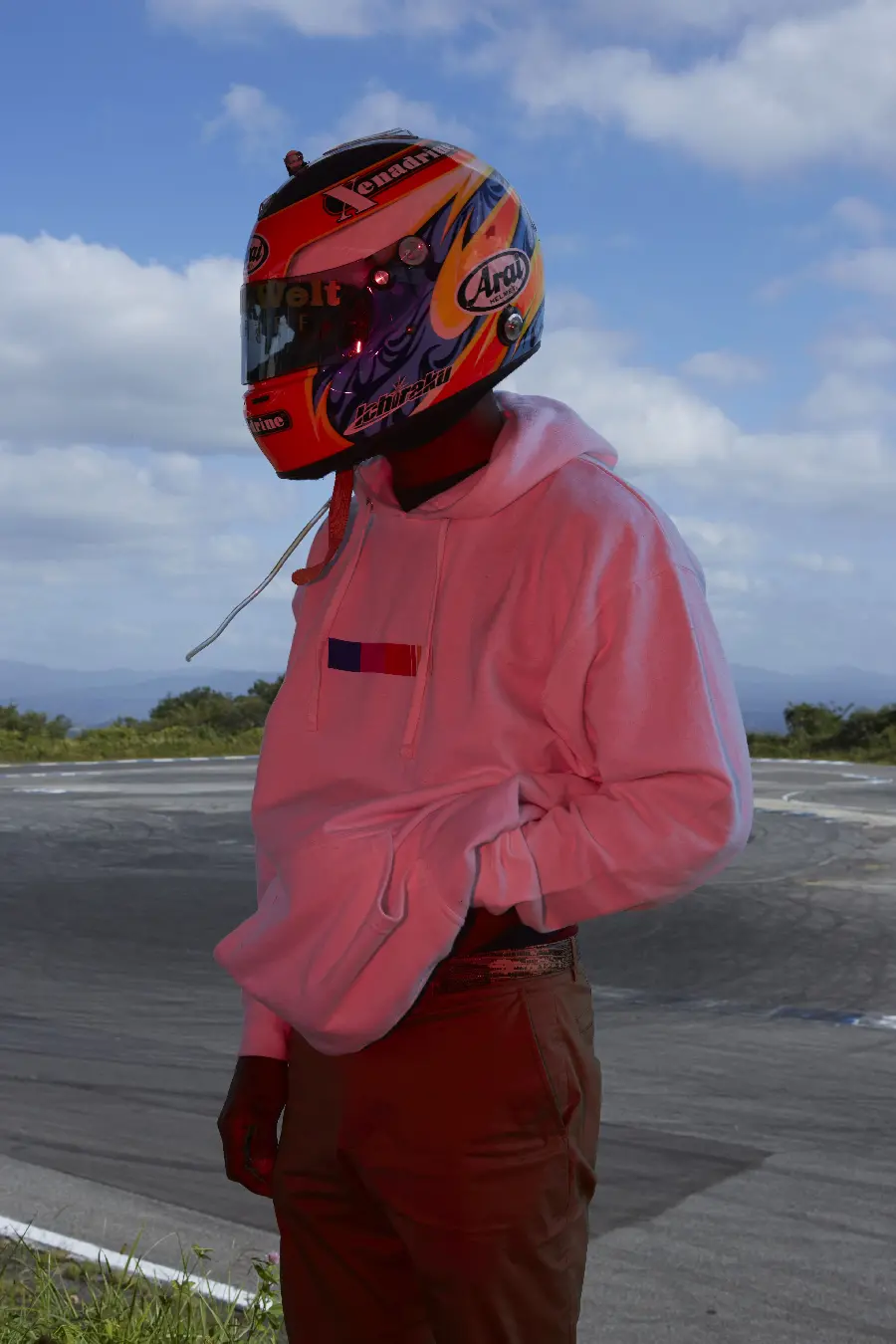 Cool Profile Picture of Man in Pink Hoodie and Motorcycle Helmet