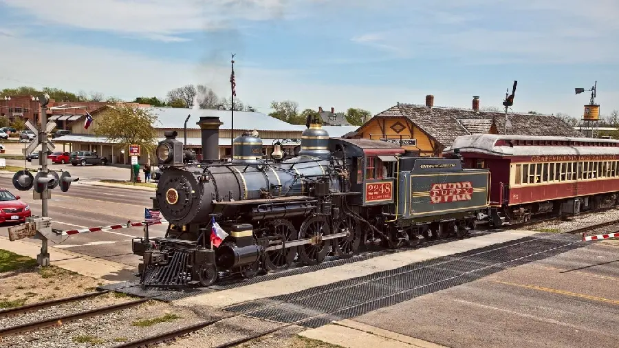 Most Beautiful Black Steam Locomotive on Rails Photo for Social Research