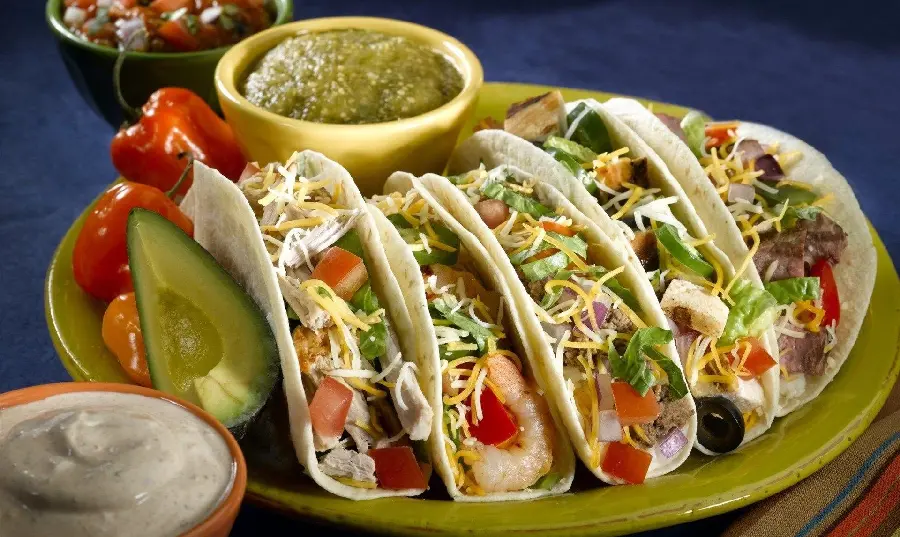 A photo of a famous Mexican food called Tostada with a delicious taste