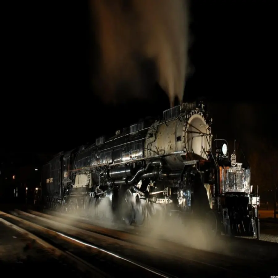 The latest wallpaper of an old black locomotive at night with excellent quality 