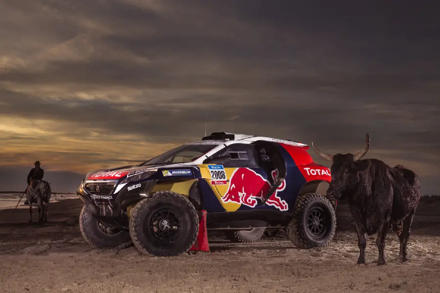 The latest image of the popular Peugeot car in the Dakar Rally with the black bull symbol Angry