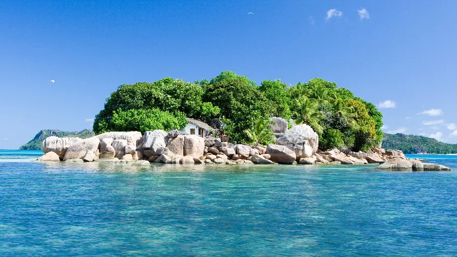Background photo of a fresh cottage on a pristine and dreamy island