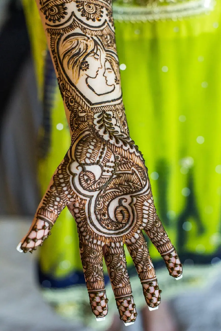 Picture of new model of henna on hand with mixed pattern of wicker and female character 