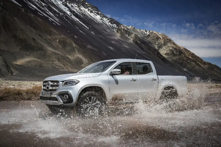 Amazing and spectacular background of a white foreign car in the water