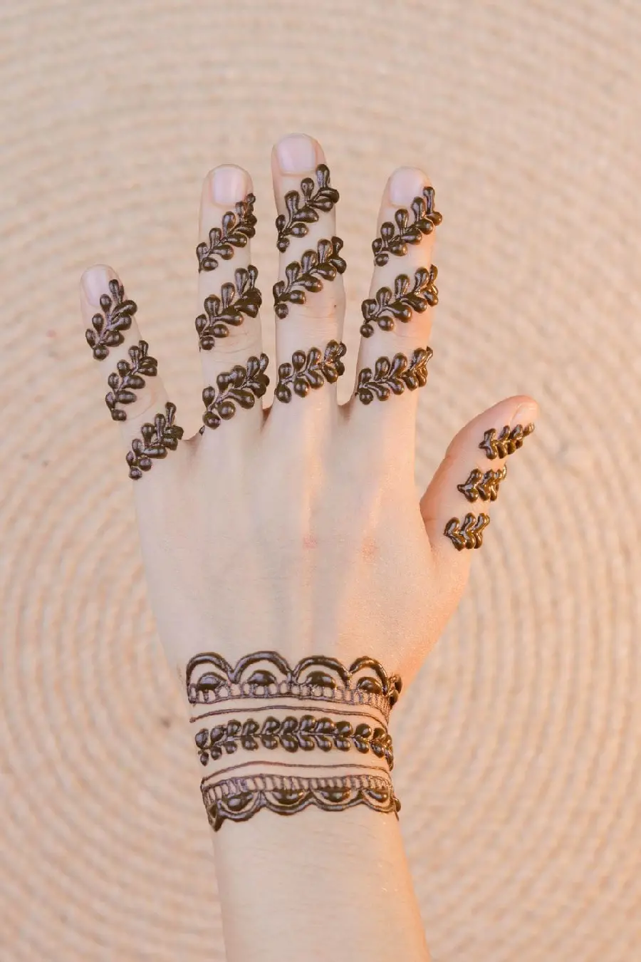 Photo of a new and stylish minimalist model of henna on the hand
