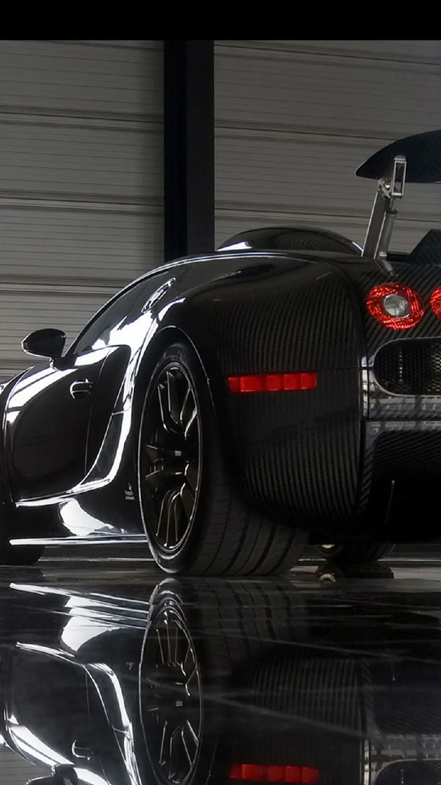 Cool boyish background with a black Bugatti design for IPhone X mobile