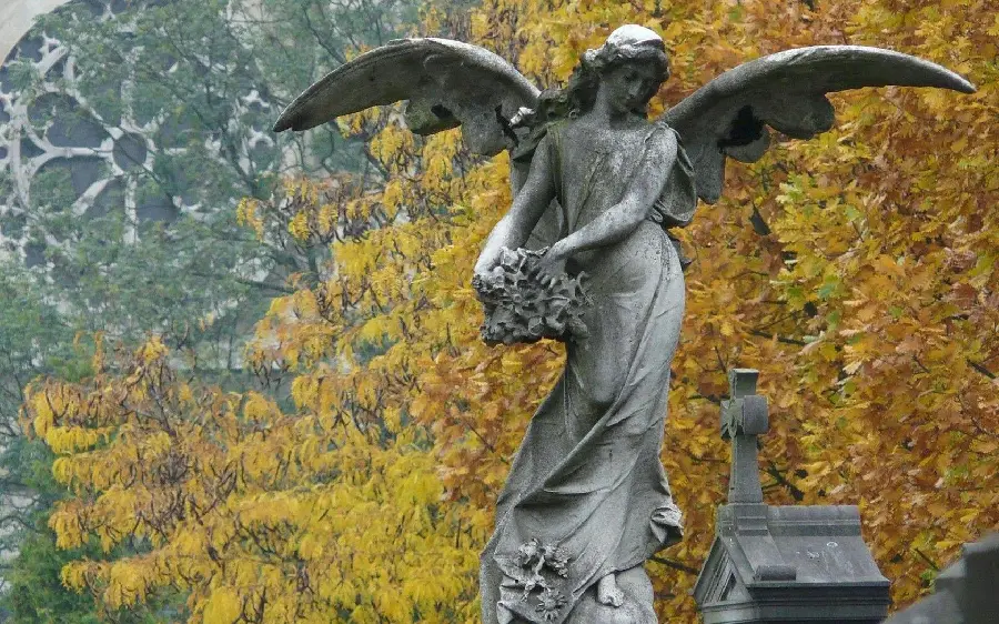 Download a beautiful and colorful stone statue of a winged angel 