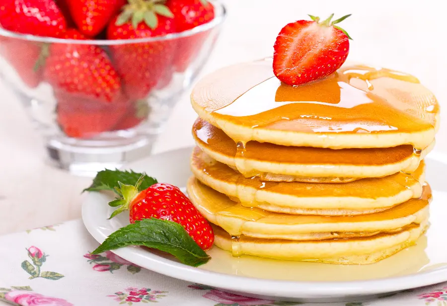 Stylish and delicious strawberry and honey pancake photo full HD 