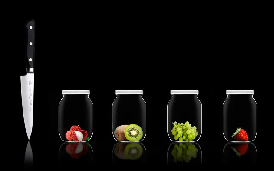 Dark wallpaper with summer fruits in glass jars