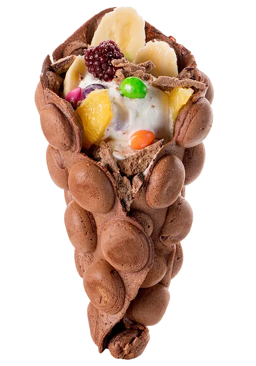 The newest model of ice cream cone with additional Smarties and various nuts 