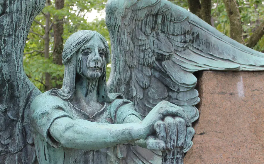 Stock photo and spectacular interesting stone statue of an angel design 