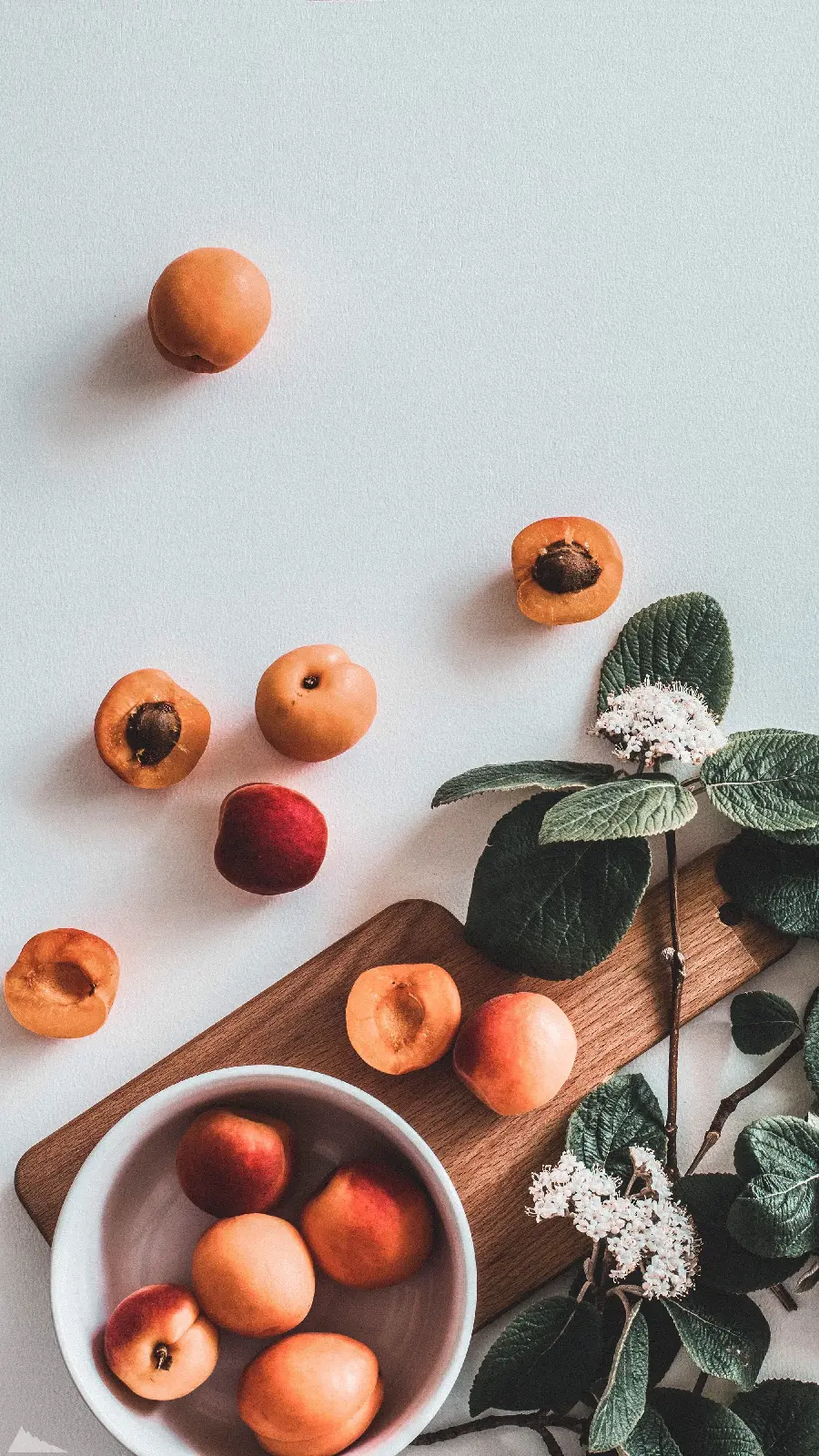 Amazing background of delicious apricots in a small bowl