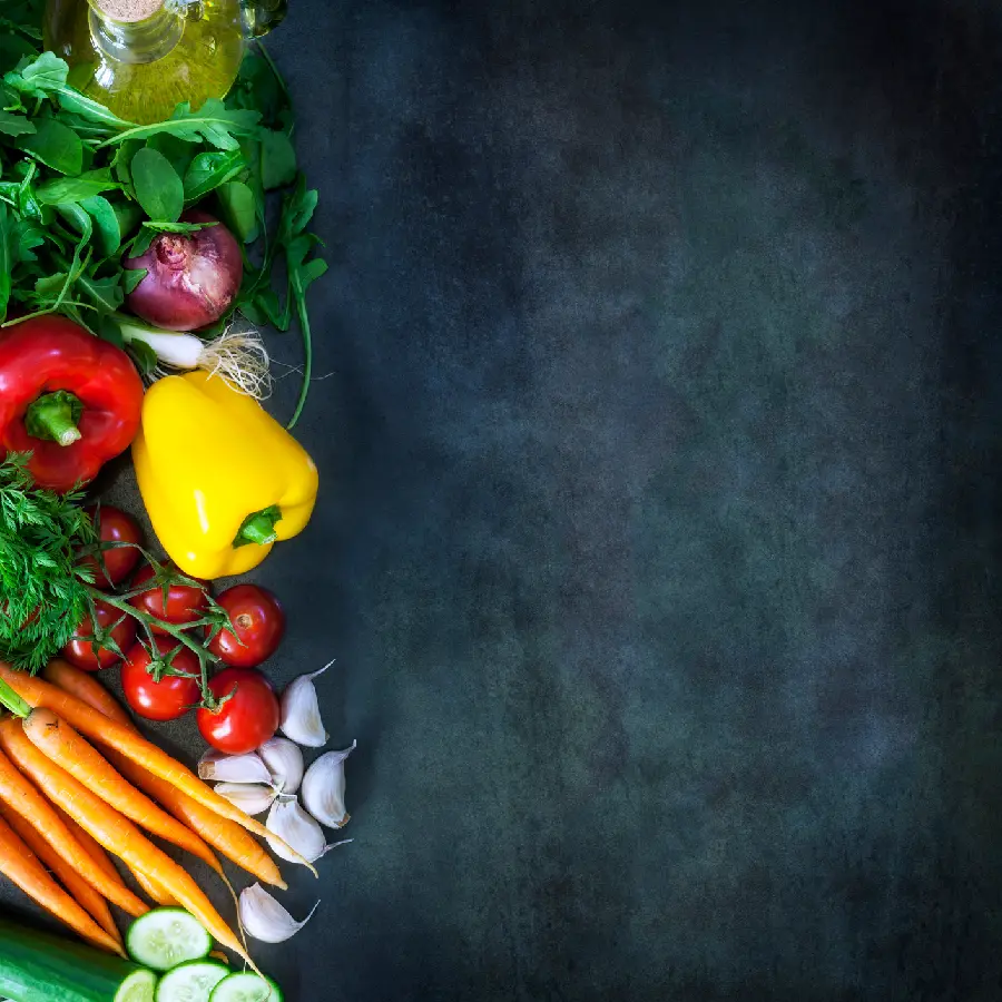 Image of fruits and vegetables with a black background for typing a restaurant menu