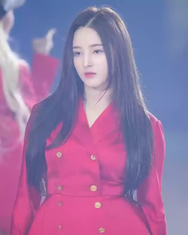 Download the amazing profile picture of Nancy in a red dress 