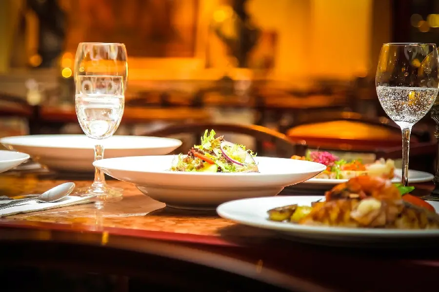 Photo of a tempting plate of food on a restaurant table for menu printing