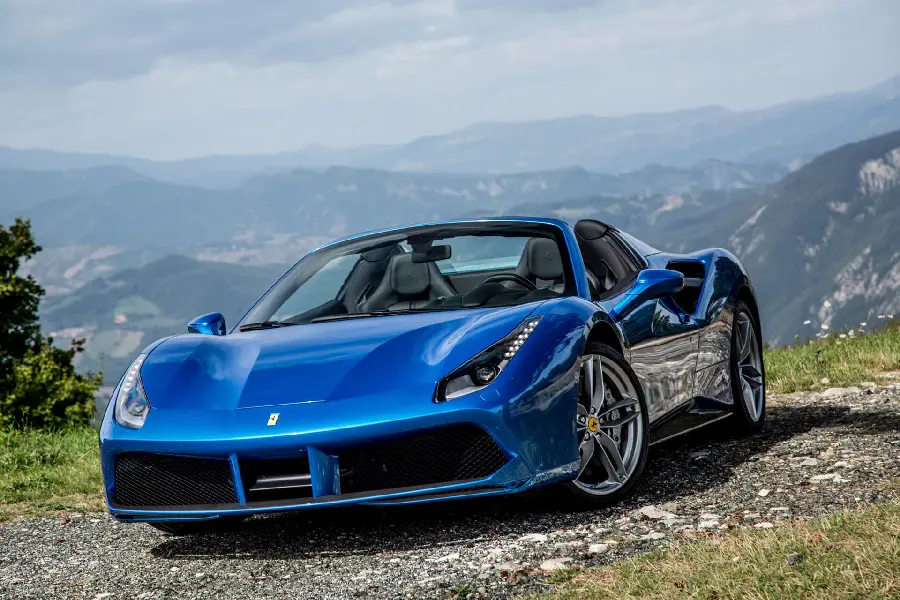 The profile photo of the Ferrari 488 Spider blue car is the most beautiful car