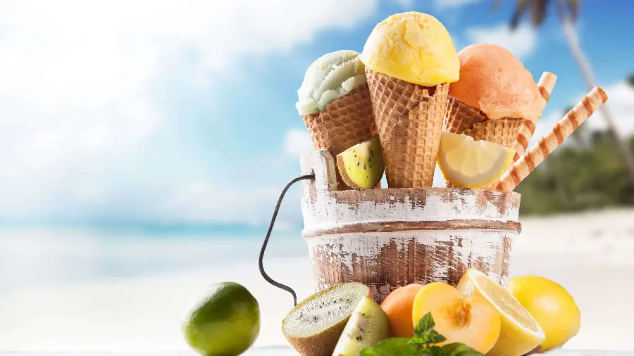 Ice cream shop banner design with a summer view of peach, lemon and kiwi ice cream