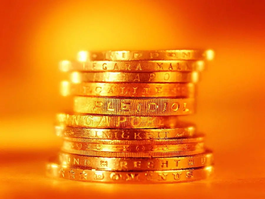 Background photo of stacked coins suitable for phone background