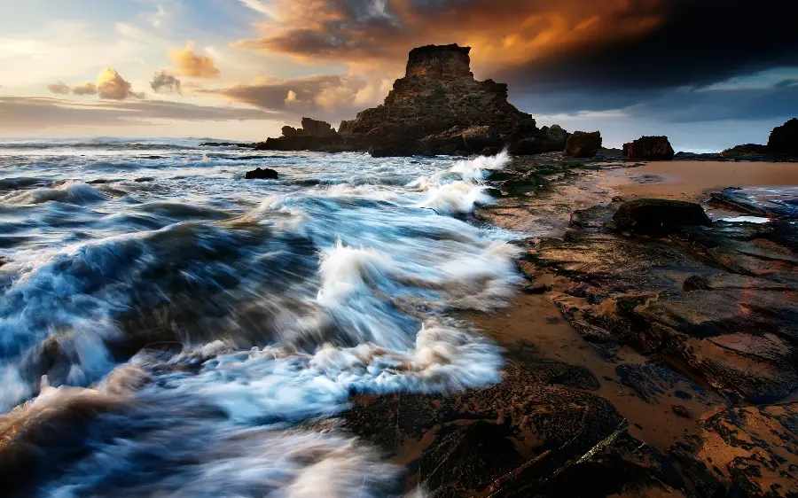 Stock image of a stormy raging sea on a gloomy autumn sunset