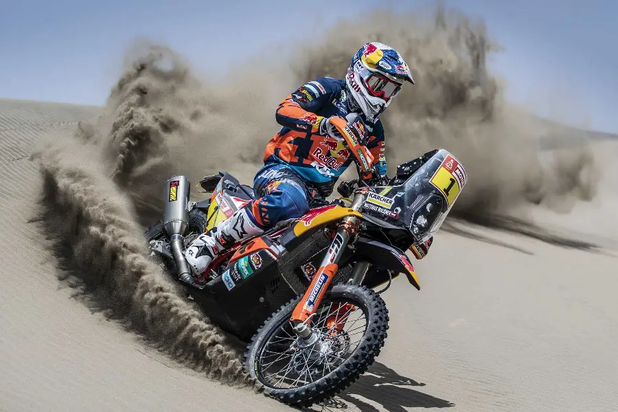 High quality image of a powerful and professional motorcyclist competing in the Dakar Rally