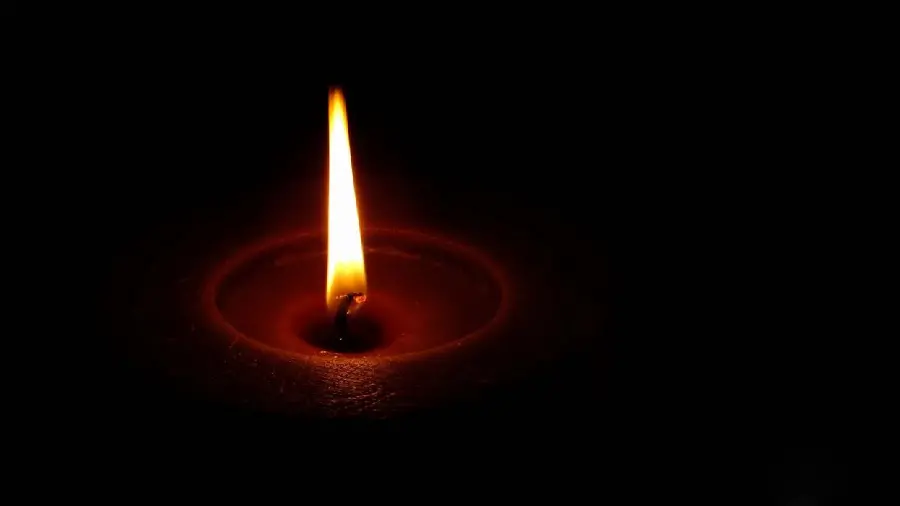 Emotional image of a candle to express condolences to a lost loved one