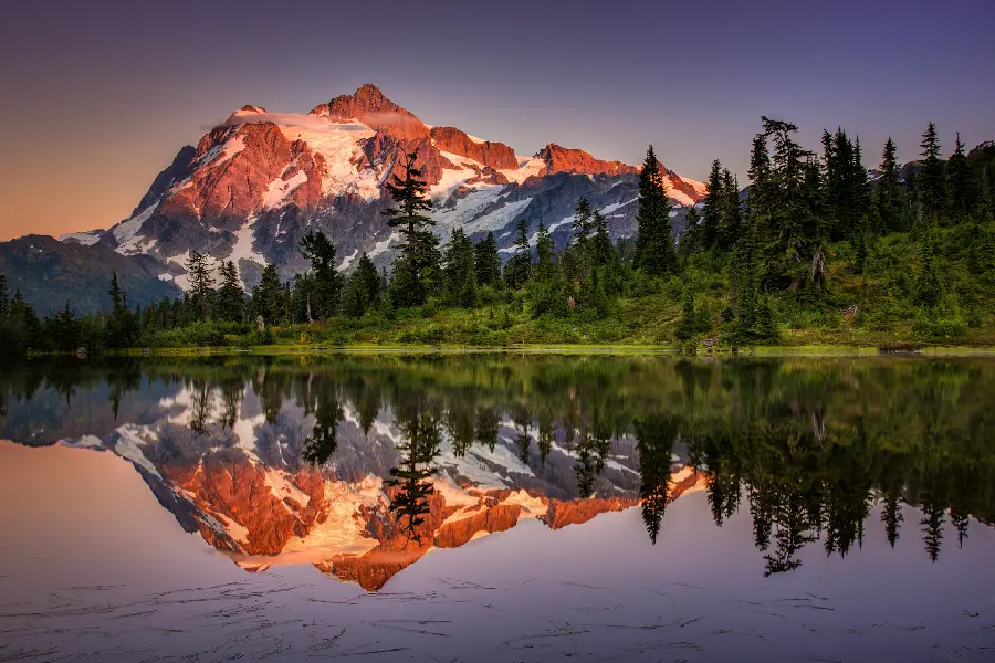 Profile photo Girly nature of a mountain lake with reflection of snow-capped mountains