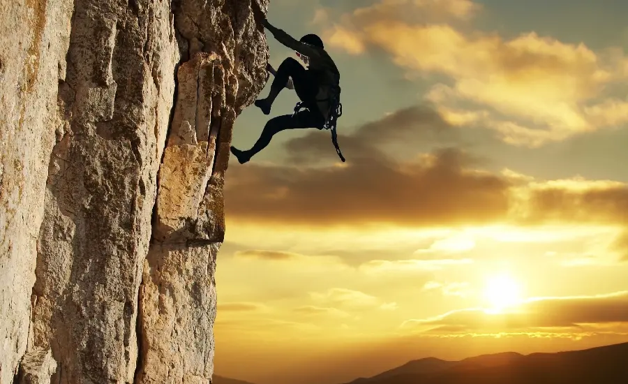 Download rock climbing photo at sunset in high quality