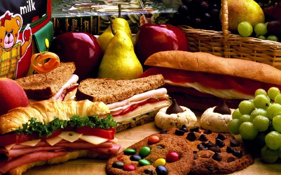 Background of various types of delicious Mexican food and sweets 