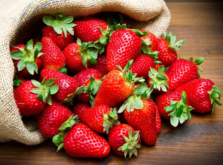 Beautiful Photo of Strawberries in a Hemp Sack