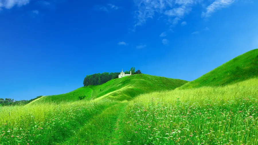 Get a wallpaper of a green plain with a pleasant cottage