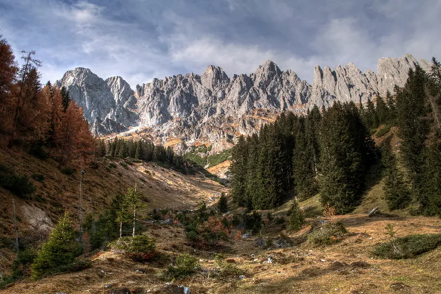Photo of a Rocky Mountain in Beautiful Nature from a Distance