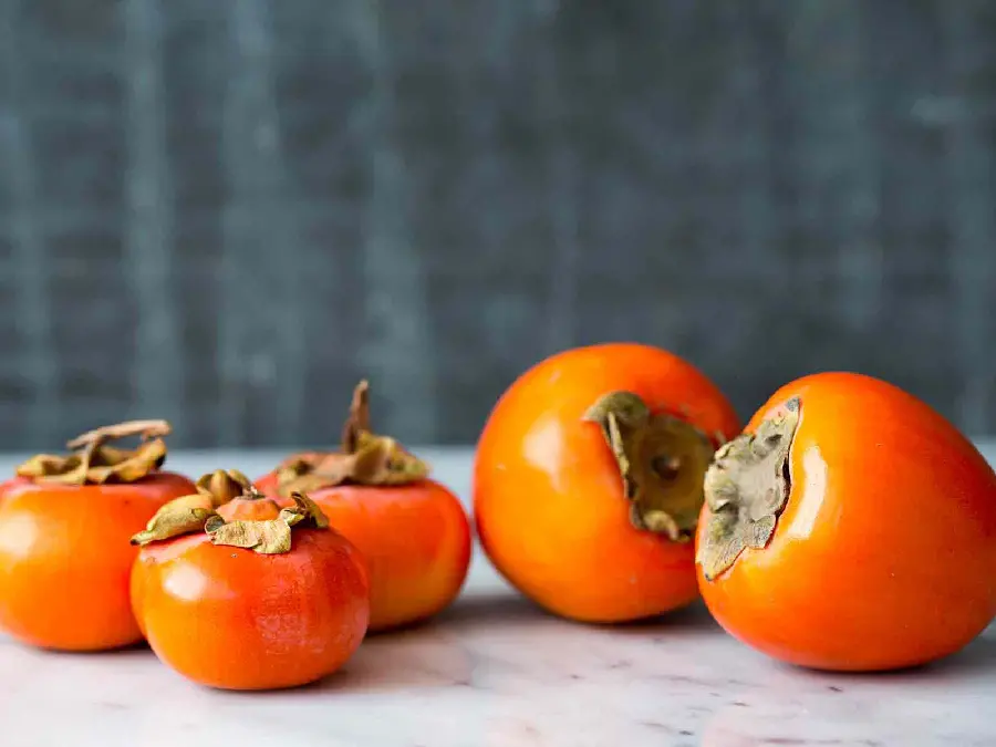 A pleasant poster to print in the kitchen of colorful and glazed persimmons