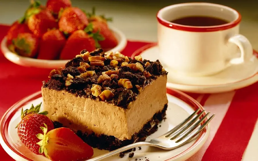Interesting and beautiful photo of beautiful walnut cake with strawberries 