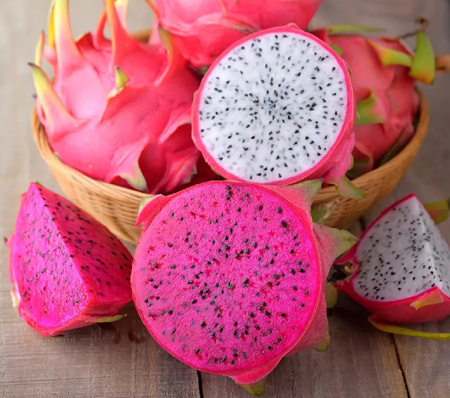 Photo of juicy and delicious dragon fruit in two different and lovely colors