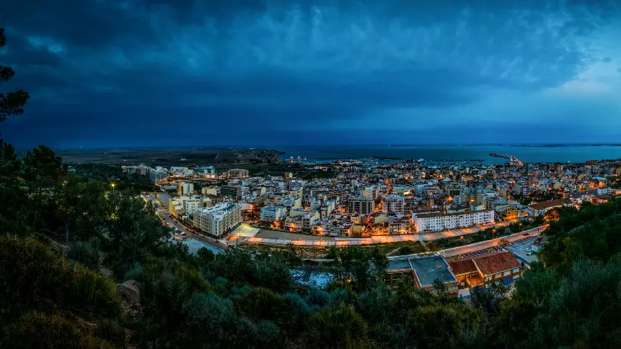A pleasant and beautiful picture of a city at night with bright lights