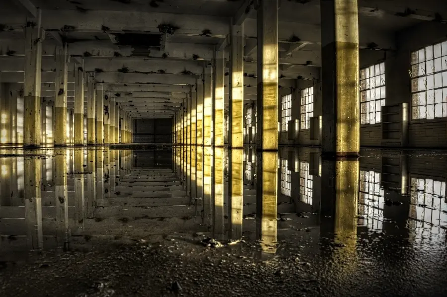 Download a portrait of a ruined and abandoned underground parking lot 