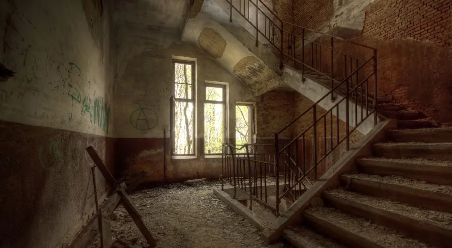 Background of an abandoned and old rotten wooden staircase
