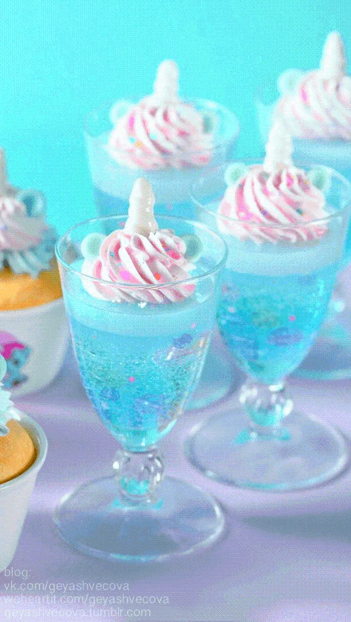 Dreamy image of ice cream in blue cups with a unicorn design in the sea