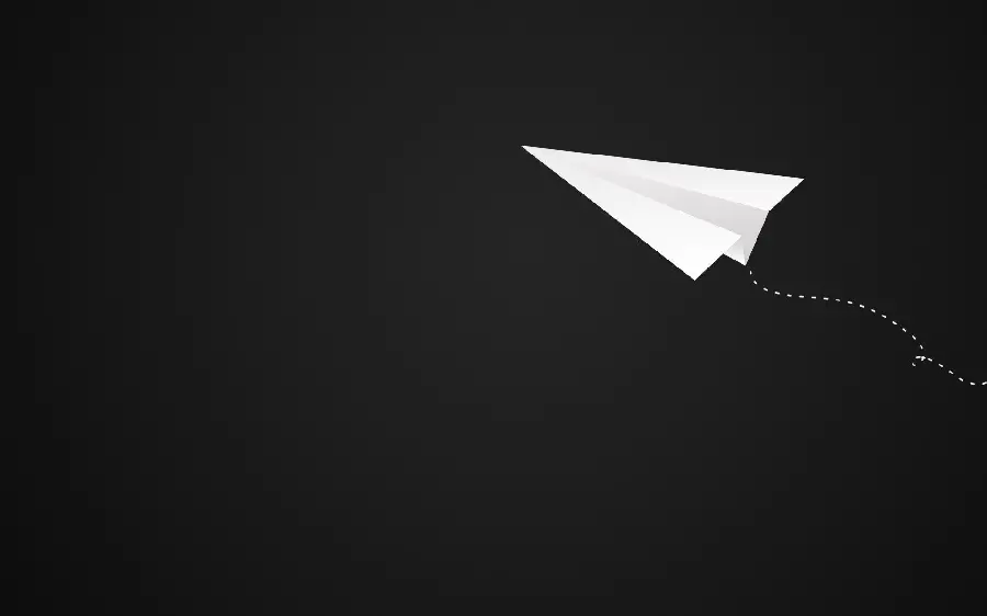 Background Googly white paper airplane on a black background for laptops