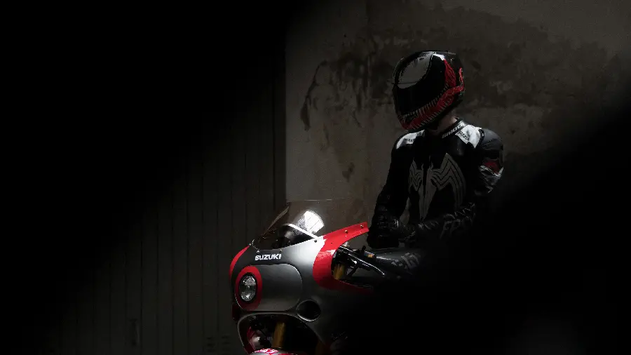IPhone Background of Boy on Suzuki Motorbike with Best Selling Helmet