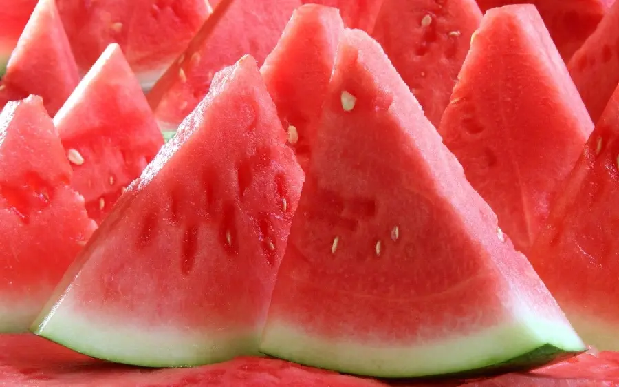 Unique and spectacular background of colorful watermelon slices 
