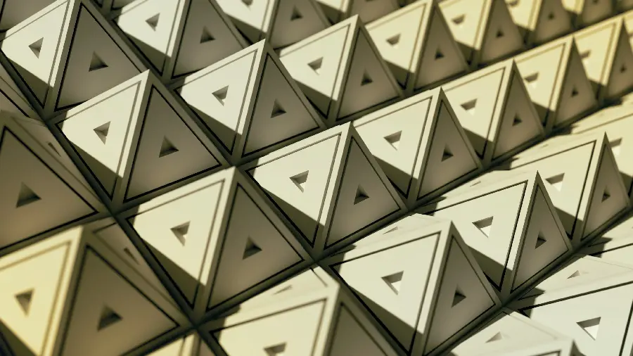 An interesting image of regular, cream-colored 3D pyramids next to each other