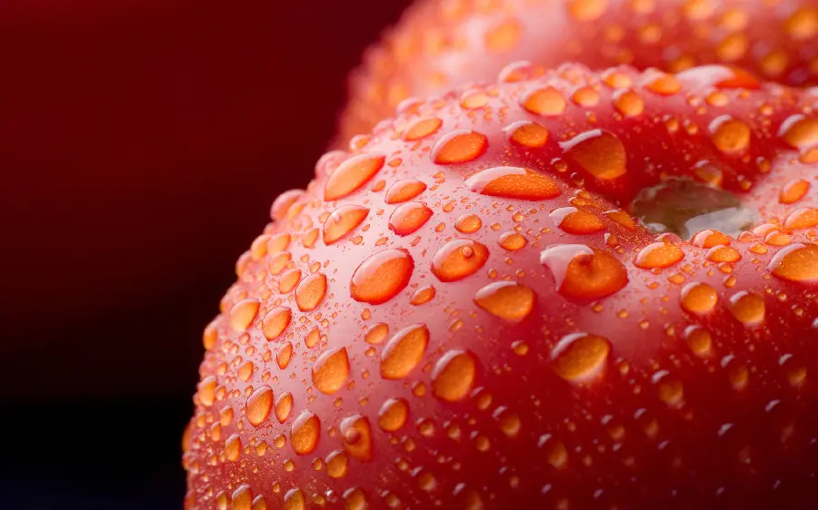 Amazing and beautiful picture of a red apple with water drops on it