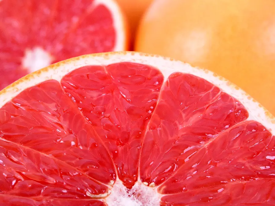 A close-up macro shot of a delicious grapefruit